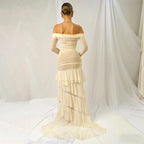 Apricot pleated long-sleeve dress, off-shoulder neckline and tiered ruffle back hem