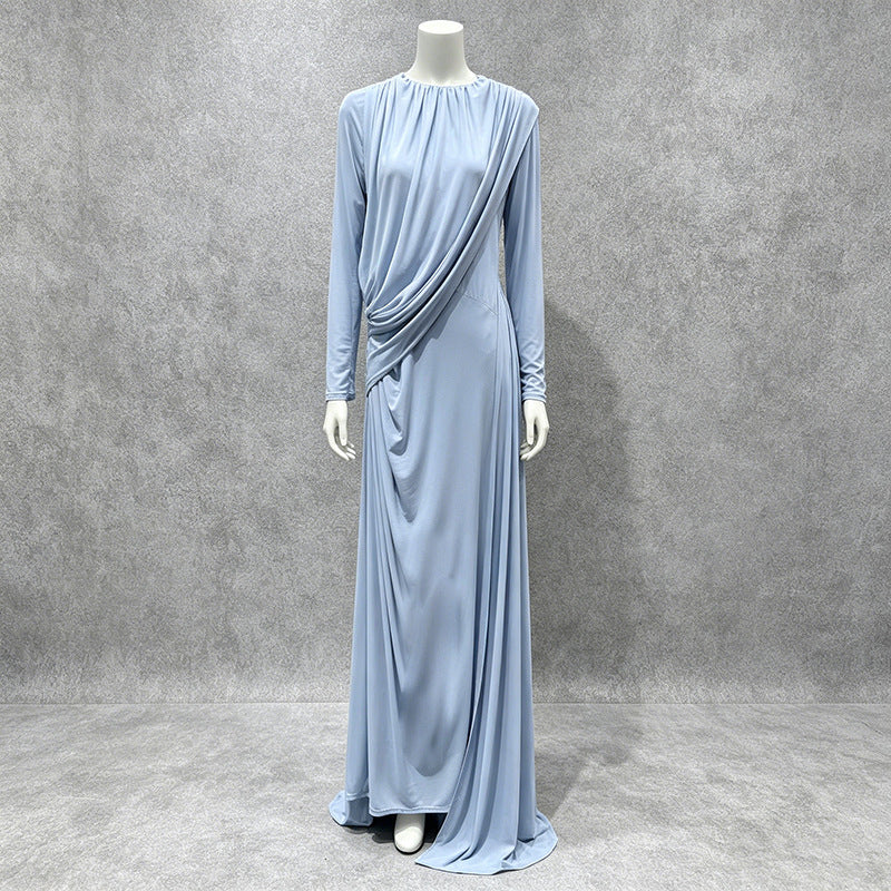 Light blue pleated formal dress with long sleeves, diagonal drape detail, full-length skirt