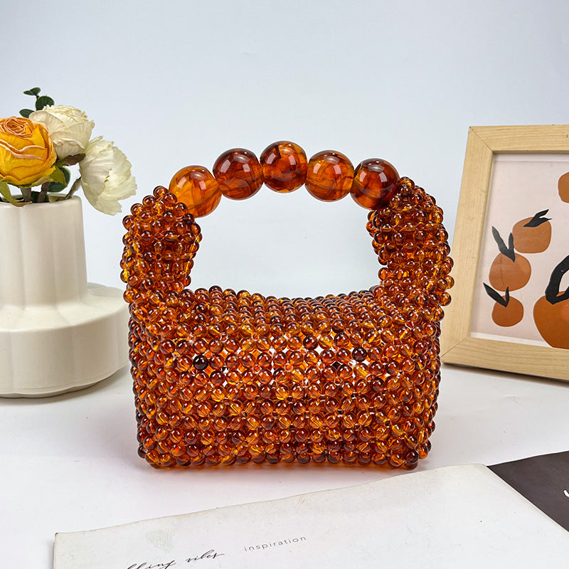 Women's Amber Beaded Dumpling Handbag