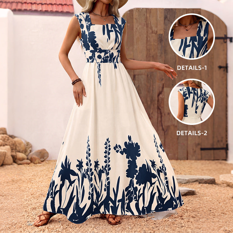 Sleeveless maxi dress, front view: blue floral print on white with gathered waist