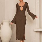 Backless women's dress in dark brown with long sleeves and oval ring cutout