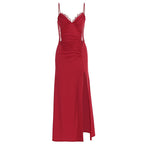 Red pleated slip dress with lace-trim straps and flowing side slit hem