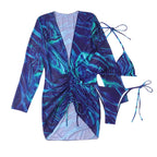 Printed blue long-sleeve halter swimsuit set with ruched waist and tie side bottoms