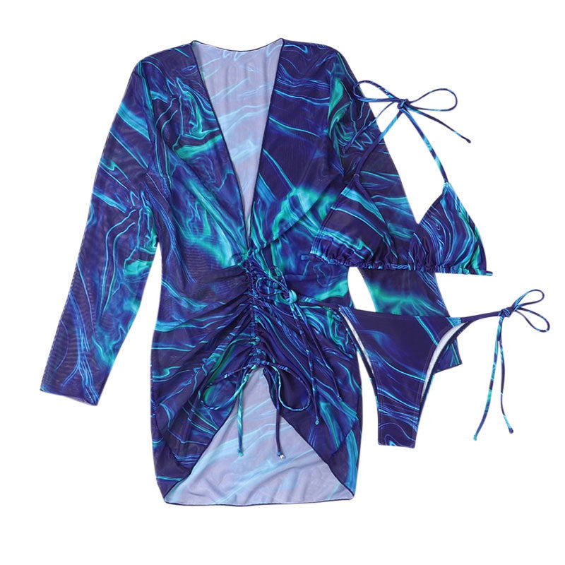 Printed blue long-sleeve halter swimsuit set with ruched waist and tie side bottoms