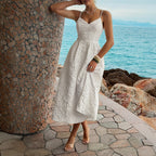 White casual summer dress with spaghetti straps and textured fabric, close front view