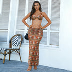 Women’s lace halter dress, orange floral print with ruched midi skirt.