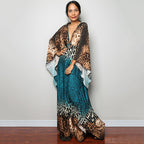 Brown and teal animal-print one-piece swim dress with V-neck and flowing sides
