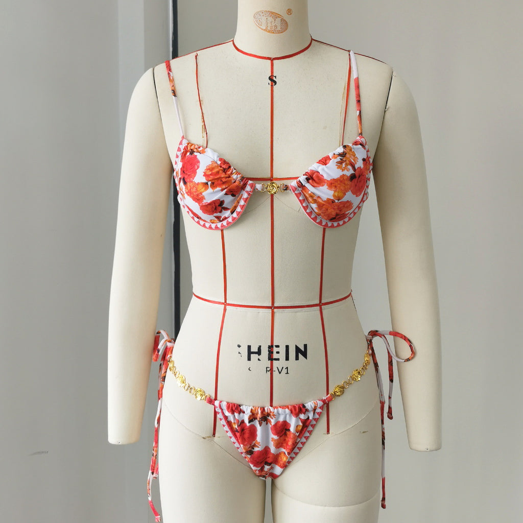 Floral one-piece swimsuit with tie straps, underwire cups, and gold-tone trim