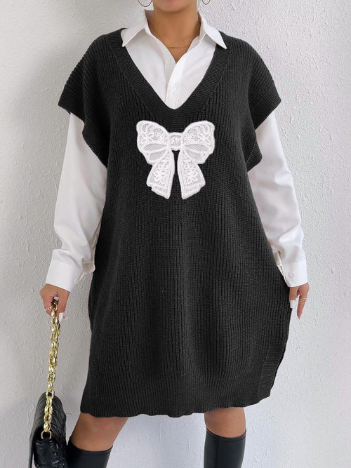 Women’s black knit vest, deep V, loose fit, white butterfly applique