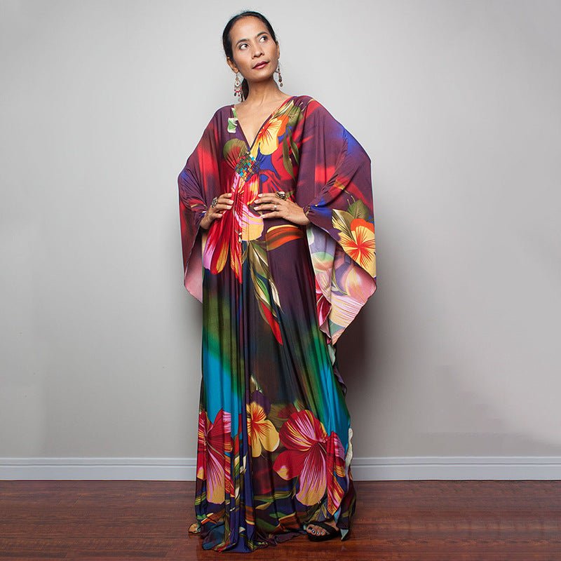 One-piece beach swim dress with V-neck and draped sleeves, multicolor tropical floral print