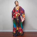 One-piece beach swim dress with V-neck and draped sleeves, multicolor tropical floral print
