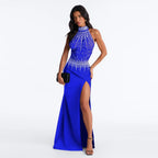 Women's sleeveless dress, blue halter with sparkling beadwork and thigh slit.