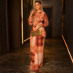 Long sleeve winter dress in orange and cream abstract floral print, draped high neck