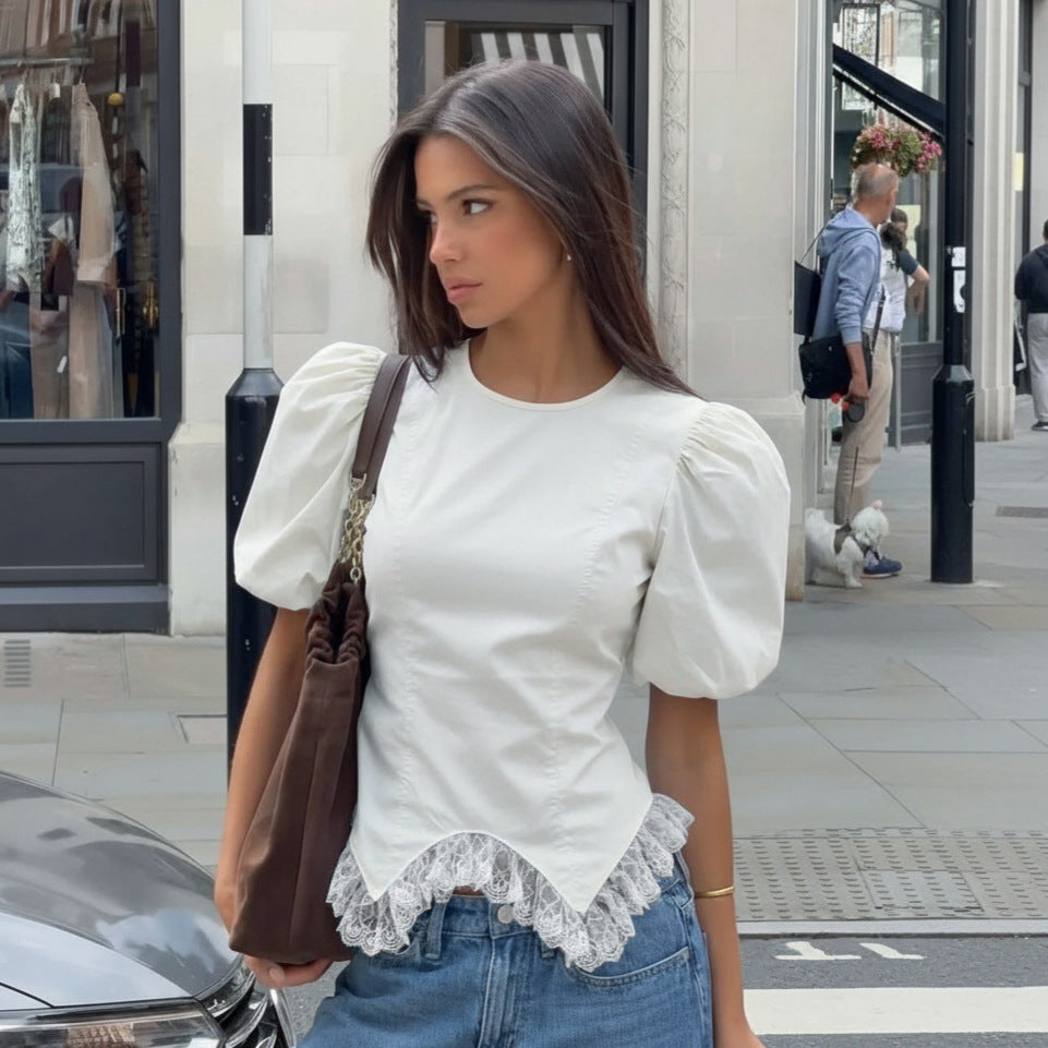 Women’s white fitted top with puff sleeves and lace-trim peplum hem