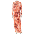 Long sleeve winter dress in orange and cream abstract floral print, sheer maxi, high neck