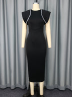 Black midi sheath cocktail dress on mannequin with short sleeves and trim piping