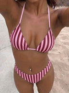 Pink striped halter triangle bikini top with matching high-cut bikini bottom