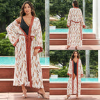 Mid-length rayon beach cover-up shirt, peach and rust abstract print, tie waist, open V-neck