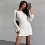 Women’s lace-textured mini dress with long sleeves, fitted waist and square neckline