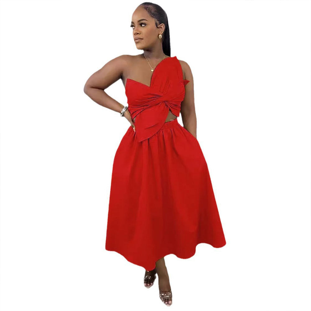 Red sleeveless midi dress with wrap-style knot at bodice and gathered skirt