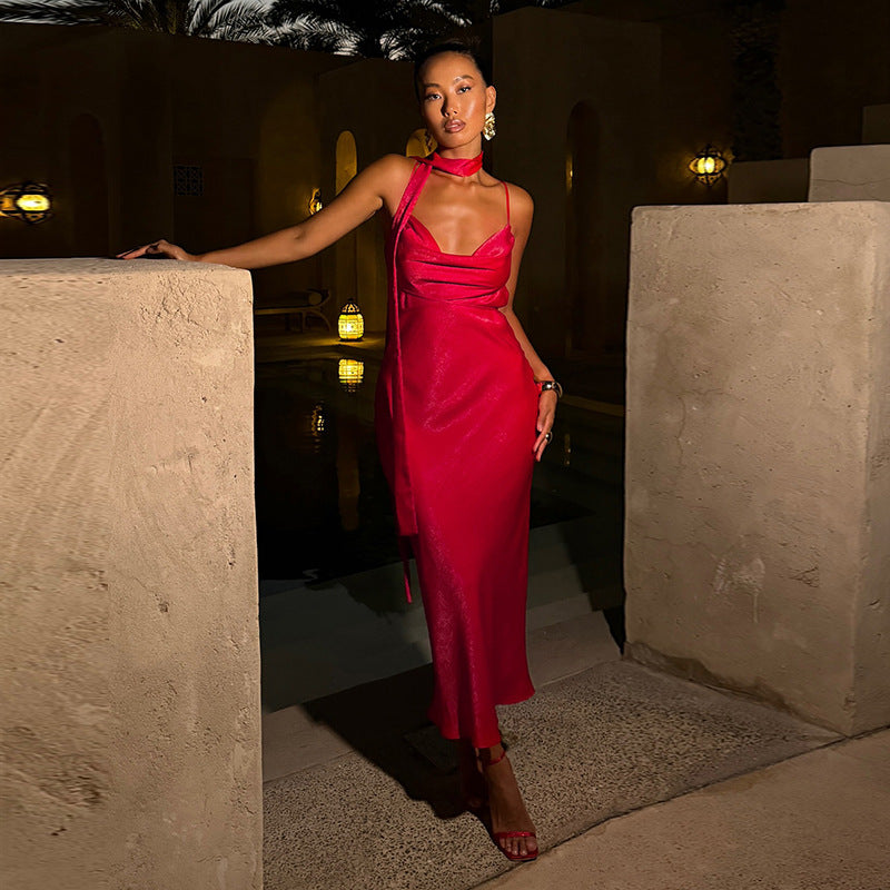 Red satin cami dress with spaghetti straps and draped neckline