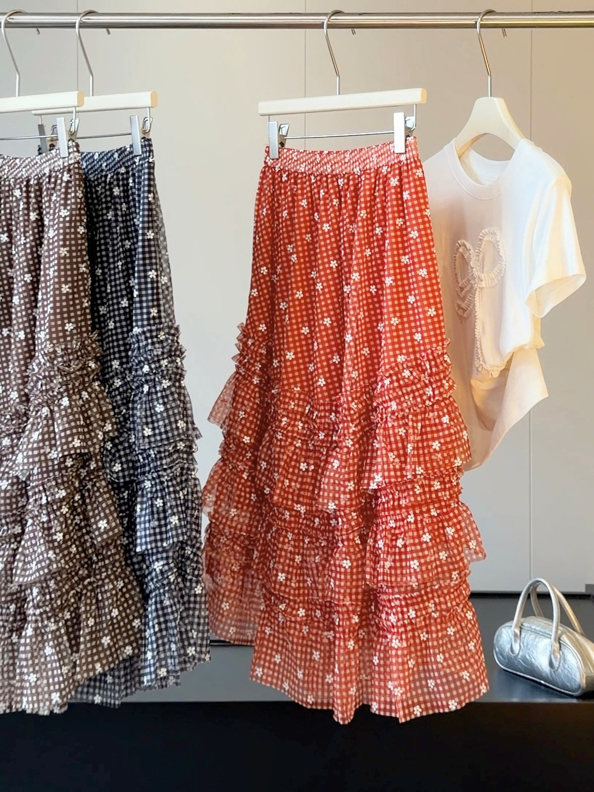 Red A-line tiered mesh skirt with allover floral plaid print and ruffle layers