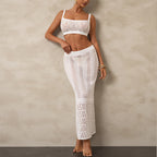 White crocheted sleeveless dress with square neck and hollow-knit midi skirt