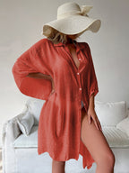 Rust red bamboo cotton cover-up shirt with short sleeves, button front, draped hem.