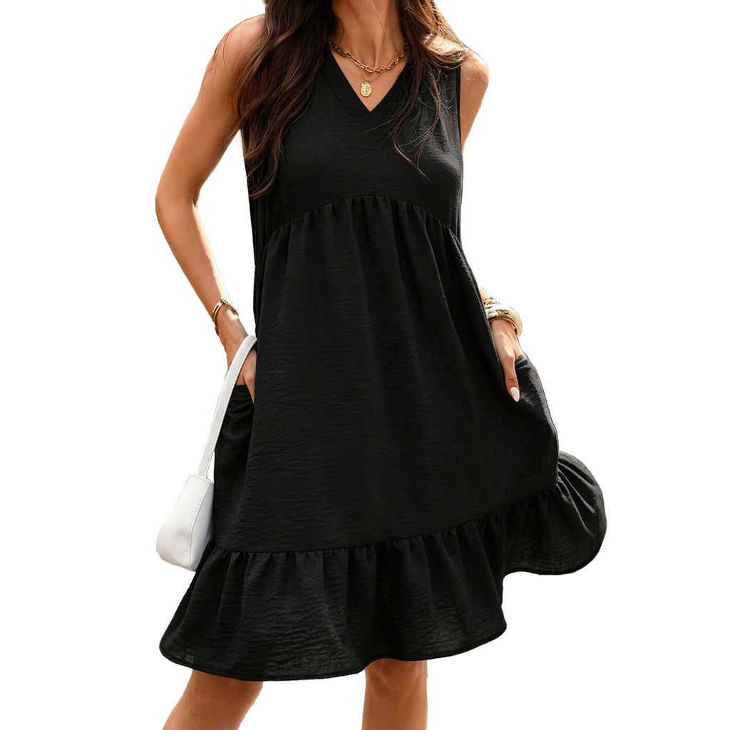 Black pleated sleeveless dress with V-neck and tiered ruffle hem