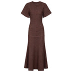 Brown maxi silk dress with short sleeves, button-front placket, and textured tiered skirt.
