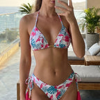 Floral triangle bikini top and tie-side bikini bottoms with tassel accents