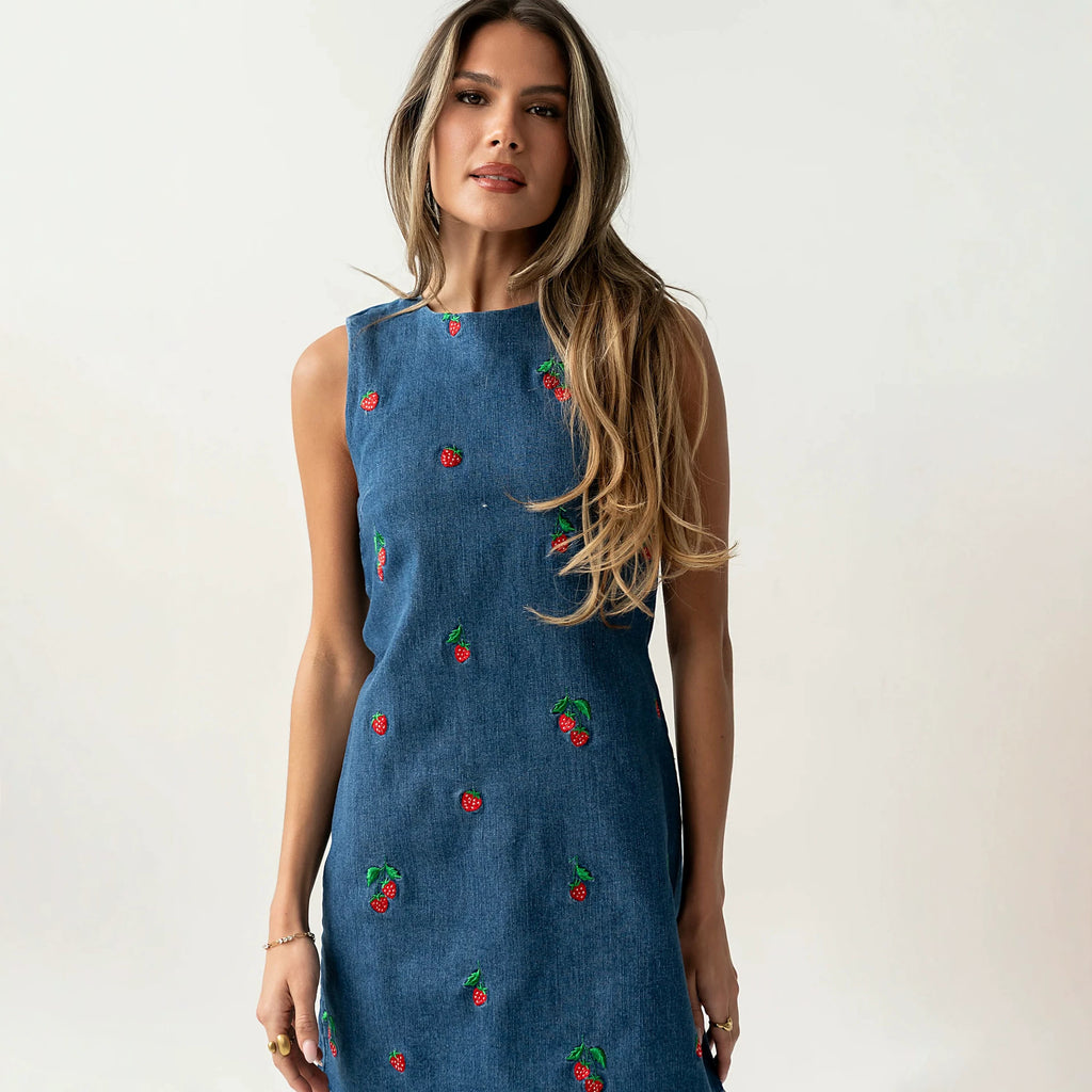 Blue denim sleeveless vest with red and green embroidery, crew neck, relaxed fit