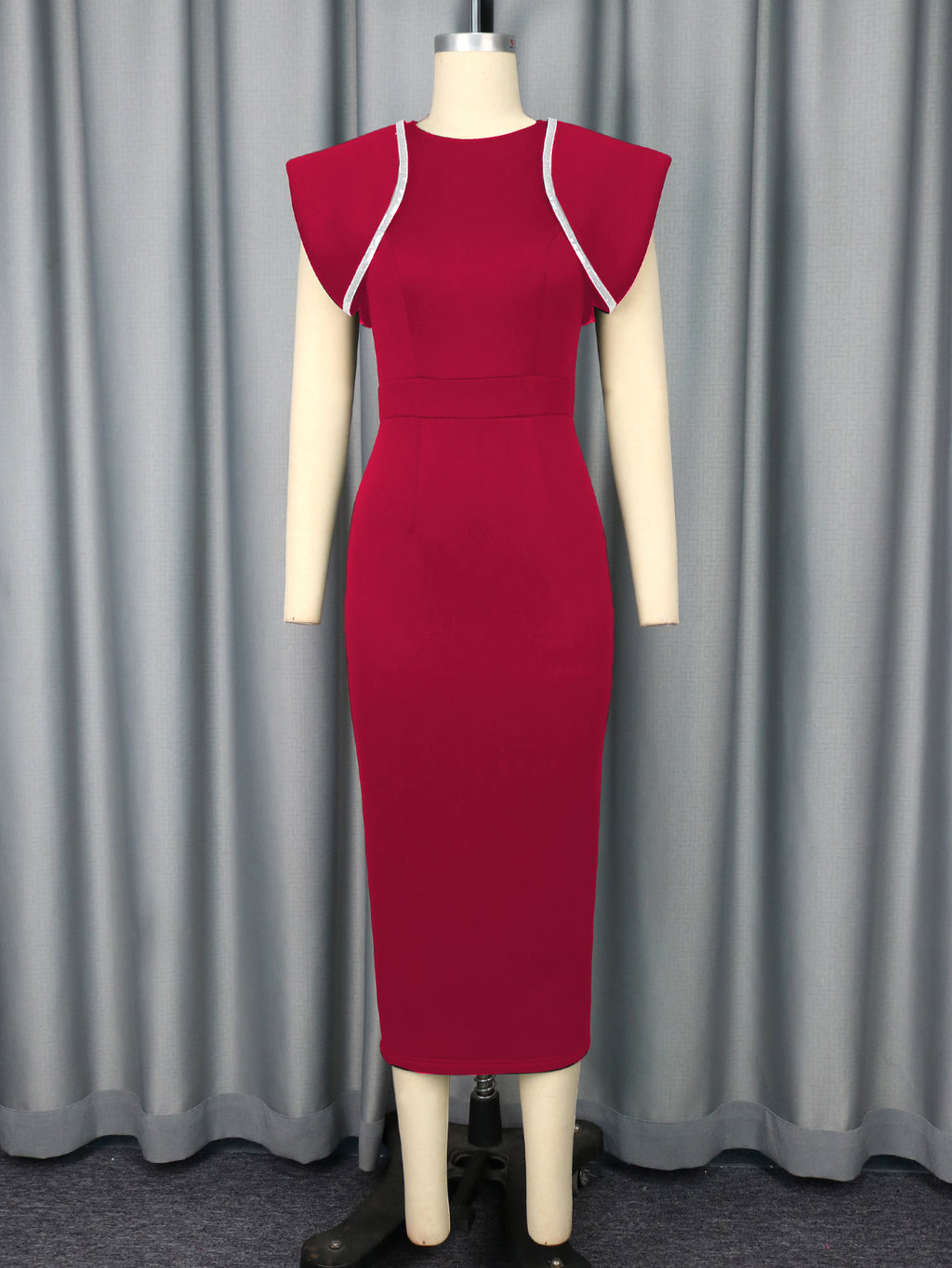 Red midi sheath cocktail dress on mannequin with short sleeves and white trim