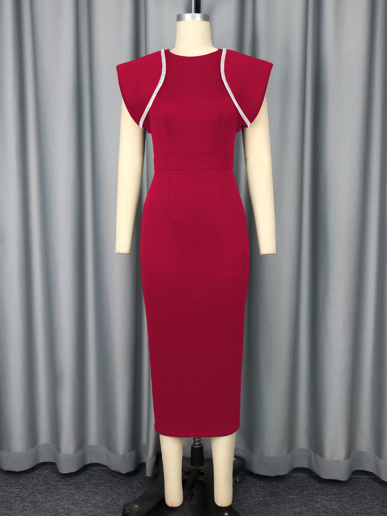 Red midi sheath cocktail dress on mannequin with short sleeves and white trim