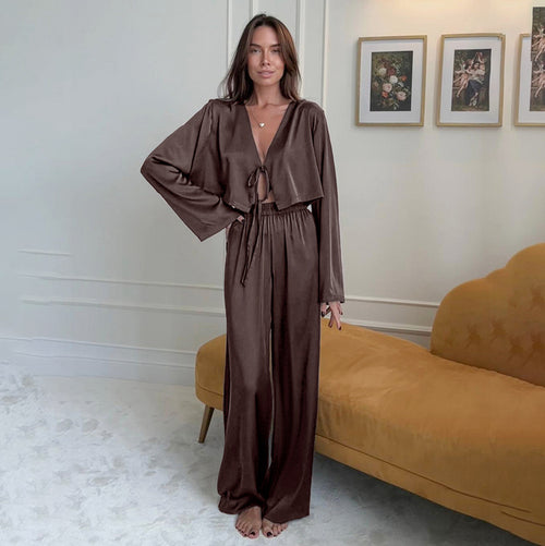 Brown satin pajama set with V-neck, tie front, and long sleeves