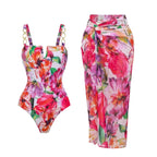Floral one-piece swimsuit with gold ring straps and matching long swim skirt
