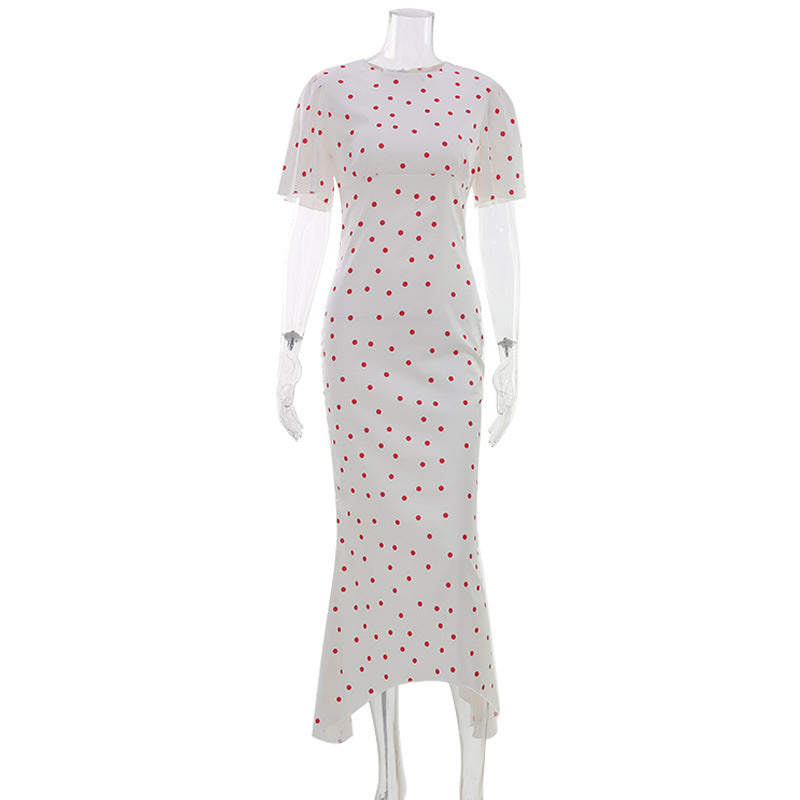 White maxi polka dot dress with short sleeves, straight fitted hem, front slit