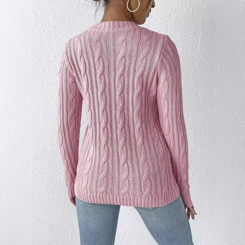 Pink cable-knit sweater back view with ribbed round neck and textured knit pattern