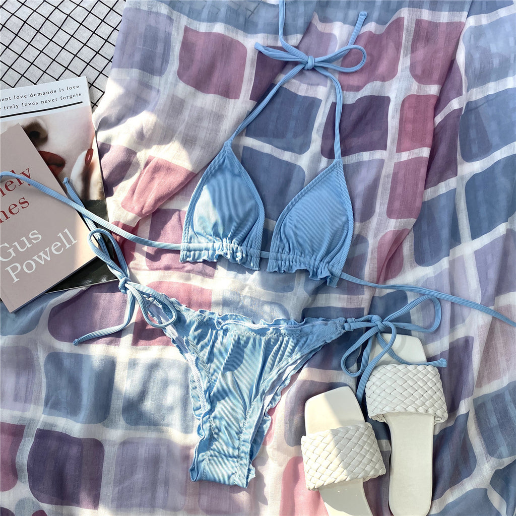 Lace-trim bikini swimwear set, light blue string tie bottoms and top on plaid fabric