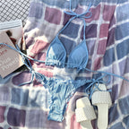 Lace-trim bikini swimwear set, light blue string tie bottoms and top on plaid fabric