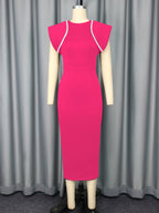 Pink midi sheath cocktail dress on mannequin with short sleeves and white trim