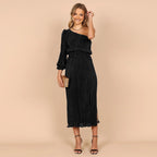 Black pleated long-sleeve midi dress with off-shoulder square neckline and fitted waist.