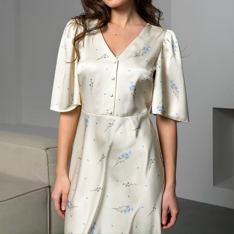 Ivory satin maxi dress bodice with V-neck buttons, flutter sleeves and blue floral