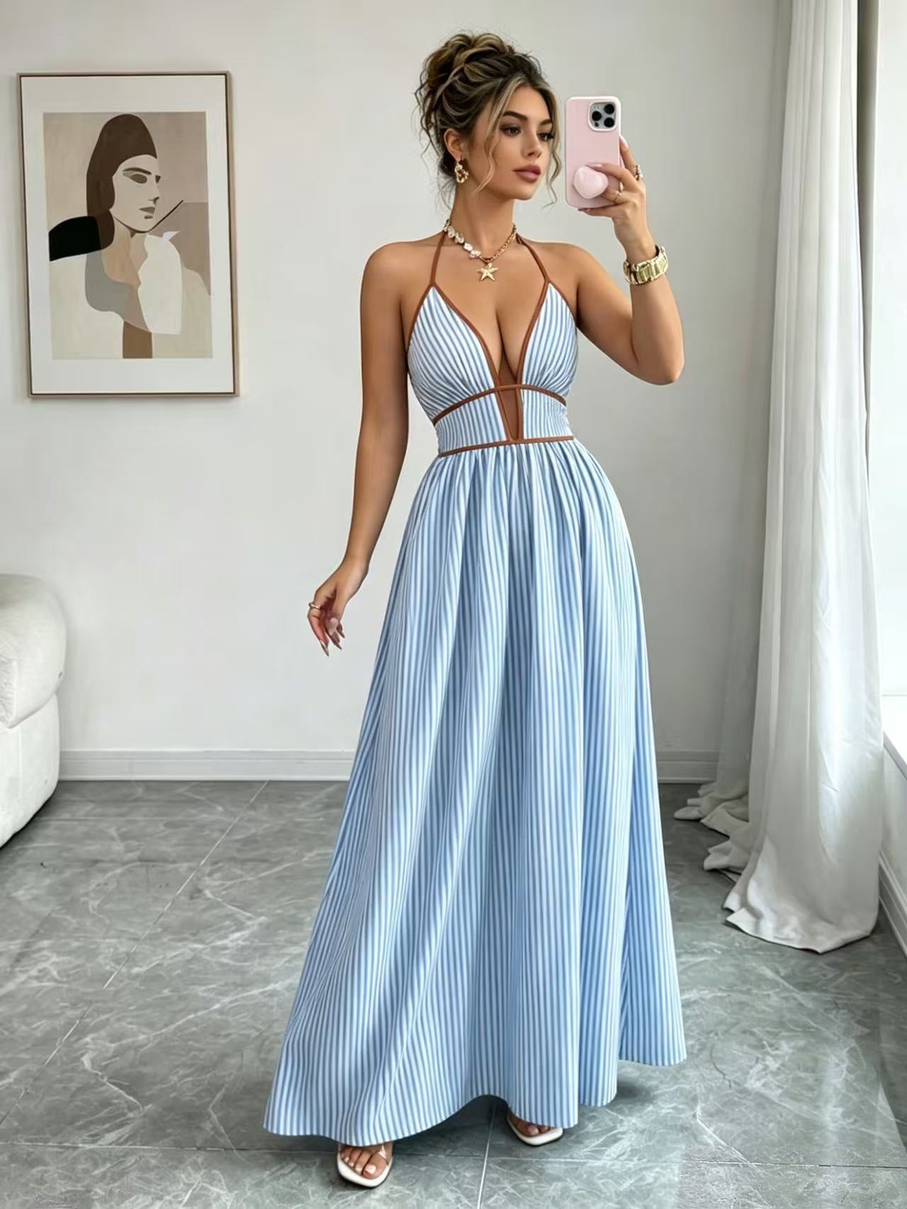 Light blue striped halter maxi dress with V-neck and flowing maxi skirt