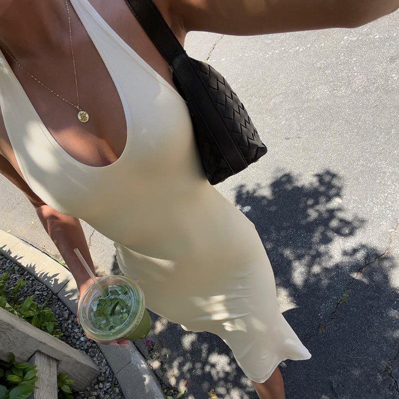 Apricot halter dress bodice close-up with deep scoop neckline