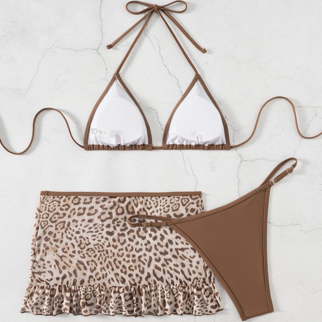 Triangle halter swim top with tied straps, leopard ruffle swim skirt, high-leg bottom