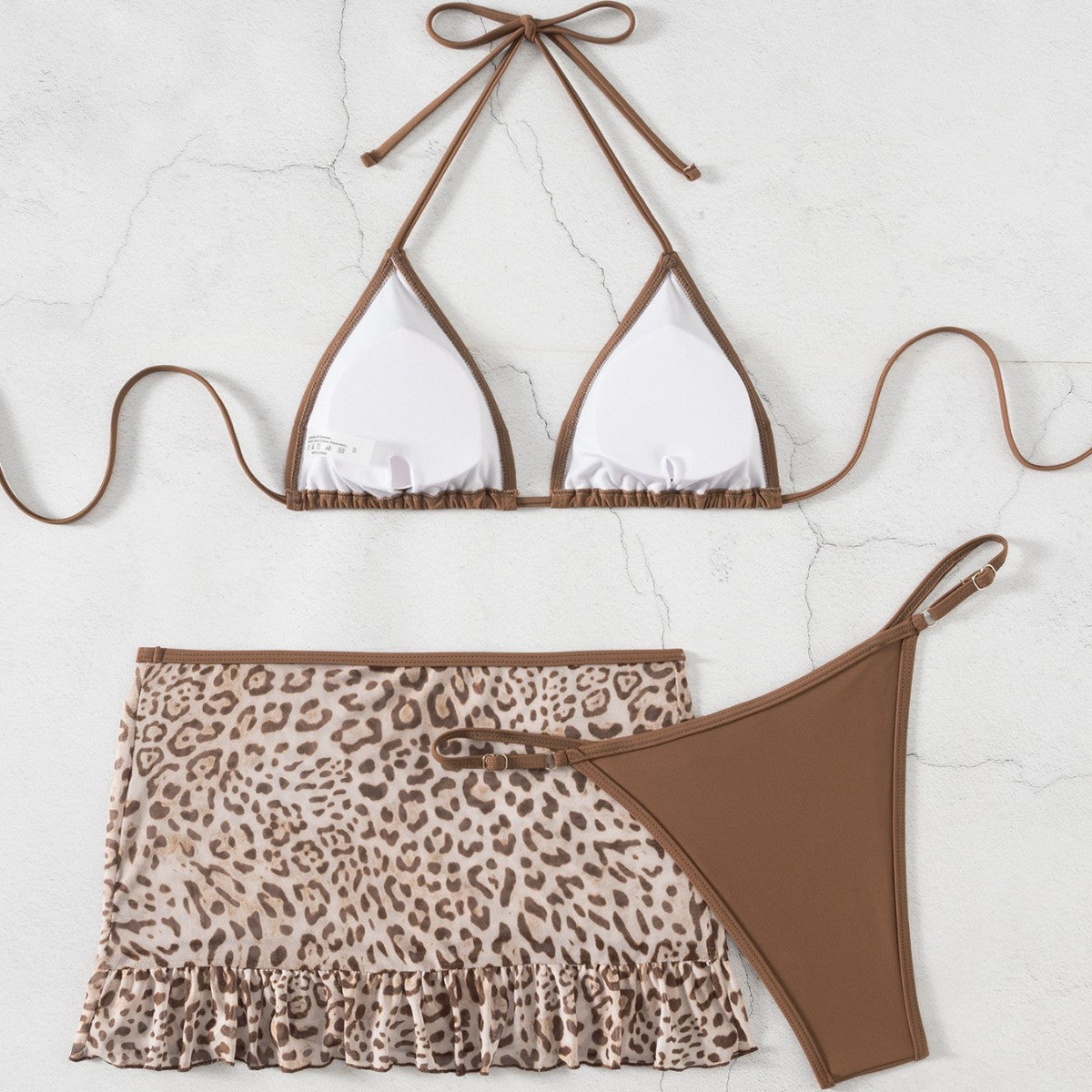 Triangle halter swim top with tied straps, leopard ruffle swim skirt, high-leg bottom
