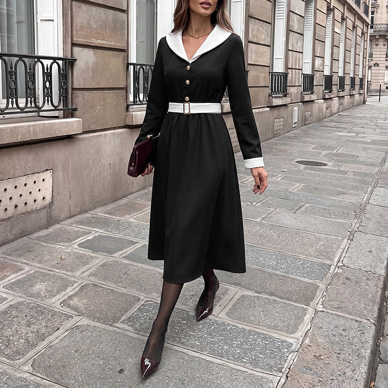 Black vintage midi dress with white collar, gold buttons, long sleeves and waist belt