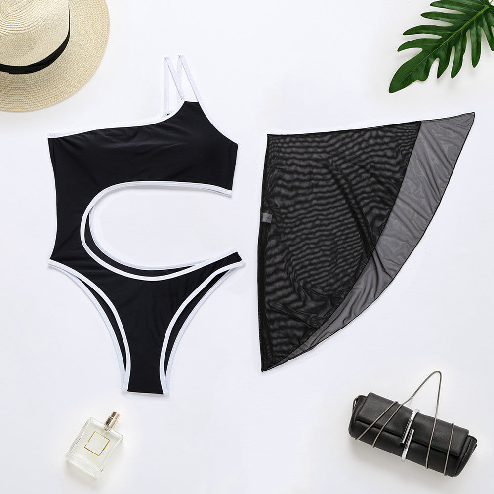 Black one-piece swimsuit with white trim and sheer mesh back panel