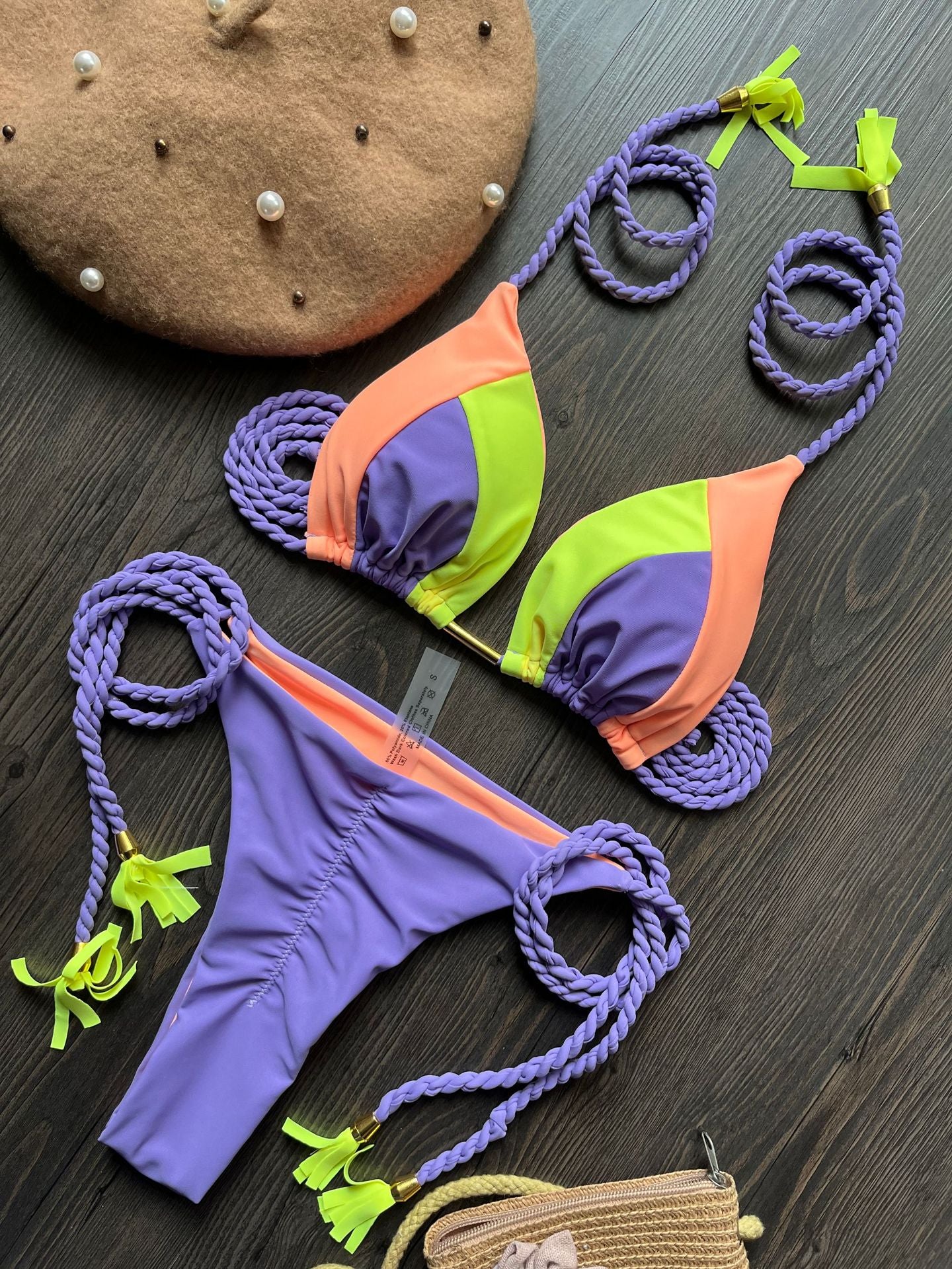 Triangle bikini set: lavender and orange top with green tassel strings and matching bottom